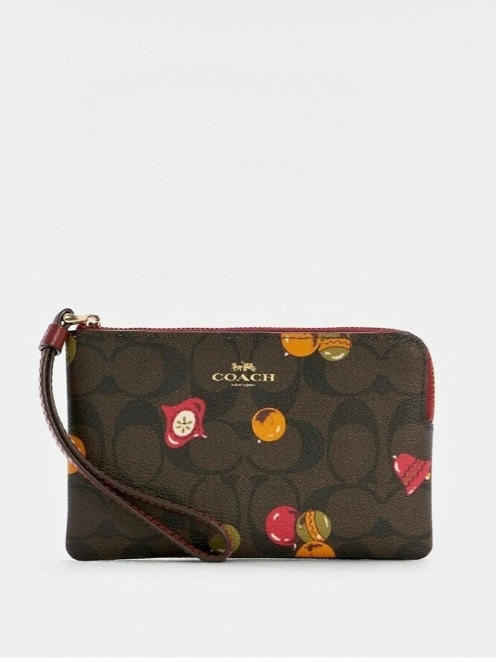 Coach Corner Zip Wristlet In Signature Canvas With Ornament Print